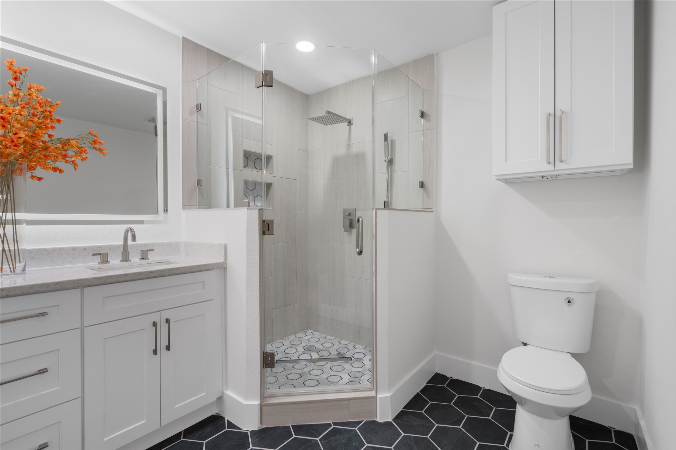 12019 Beth Lane Magnolia, TX 77354 - Photo 19 of 49 a bathroom with a granite countertop sink toilet and shower