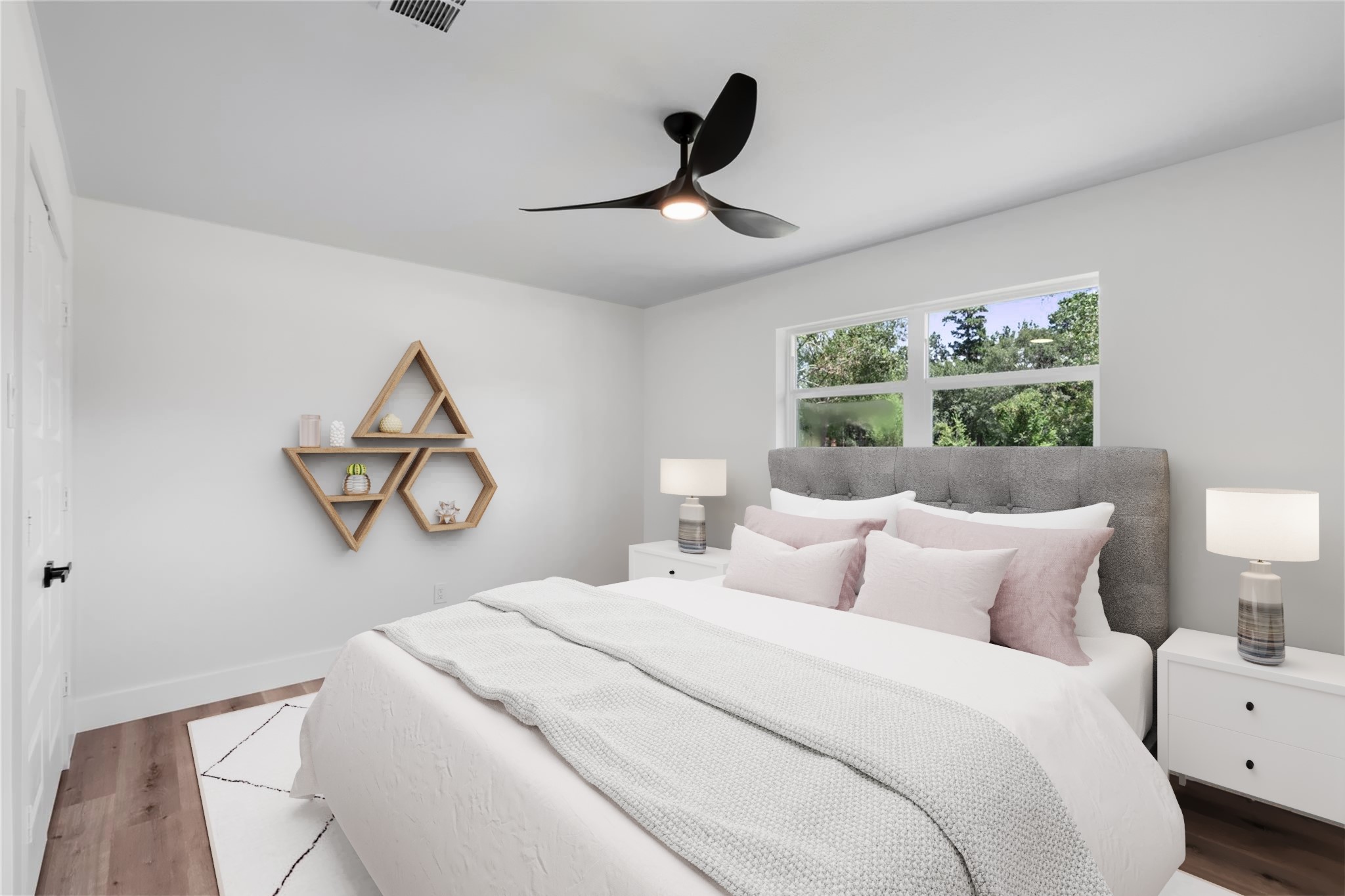 12019 Beth Lane Magnolia, TX 77354 - Photo 24 of 49 a bedroom with a bed and a window