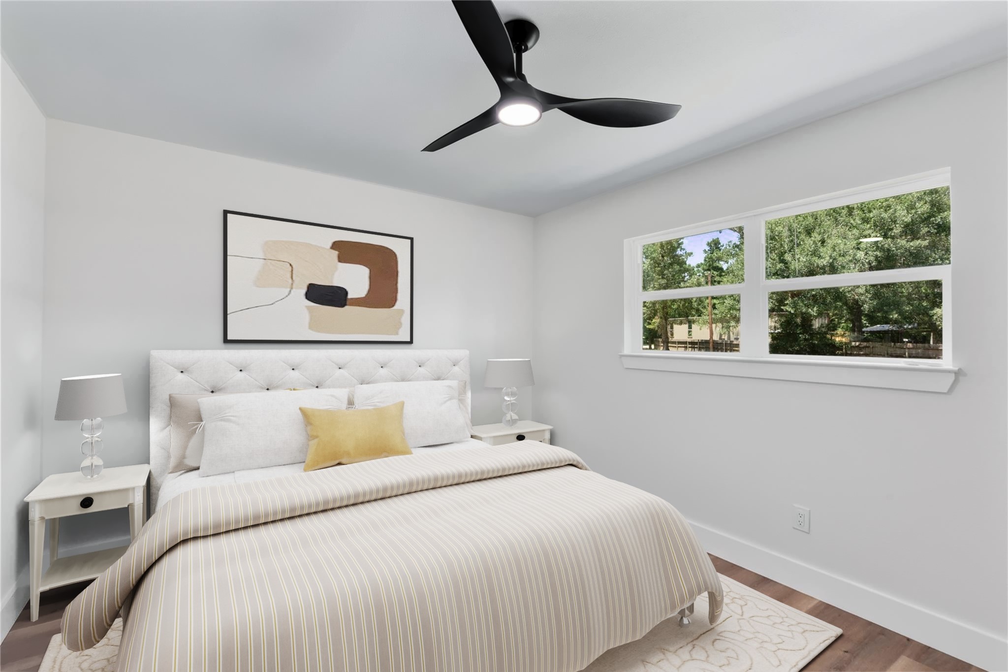 12019 Beth Lane Magnolia, TX 77354 - Photo 26 of 49 a bedroom with a bed and a painting on the wall