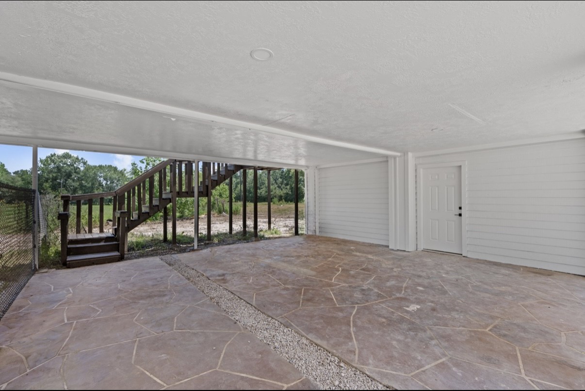 12019 Beth Lane Magnolia, TX 77354 - Photo 42 of 49 a view of an empty room with a balcony