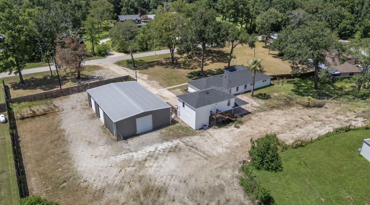 12019 Beth Lane Magnolia, TX 77354 - Photo 46 of 49 an aerial view of a house with garden space and street view