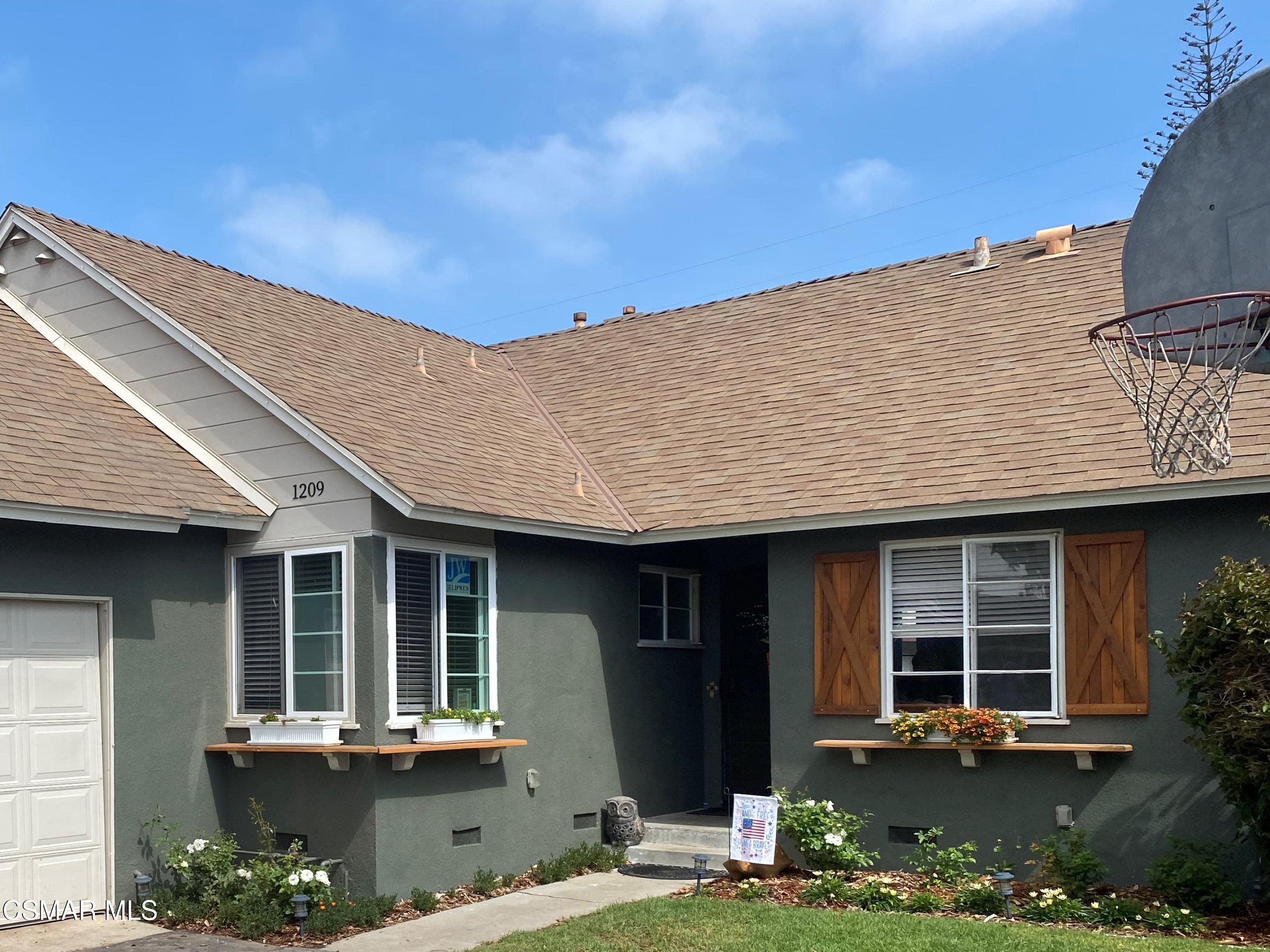 1209 West Roderick Avenue Oxnard, CA 93030 - Photo 2 of 30 a front view of a house with porch