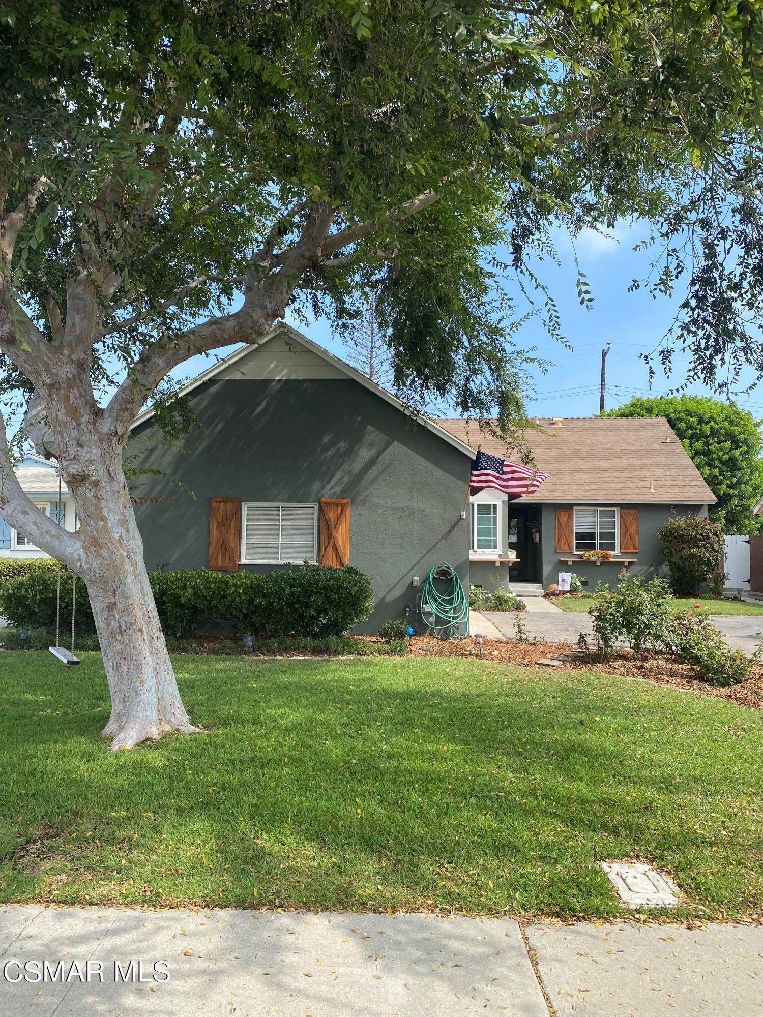 1209 West Roderick Avenue Oxnard, CA 93030 - Photo 3 of 30 a front view of house with yard and green space