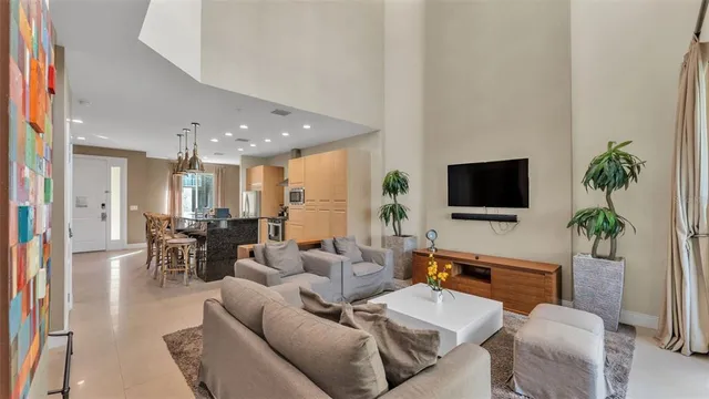 a bathroom with a granite countertop sink a toilet and a mirror