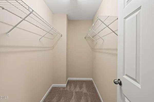 a view of small space with racks on the wall