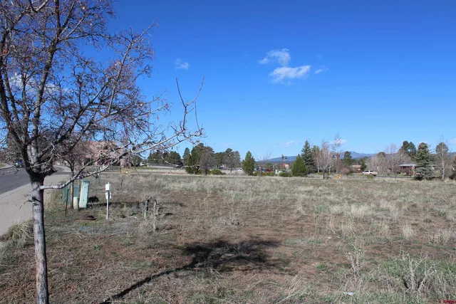 a view of lake with mountain in background