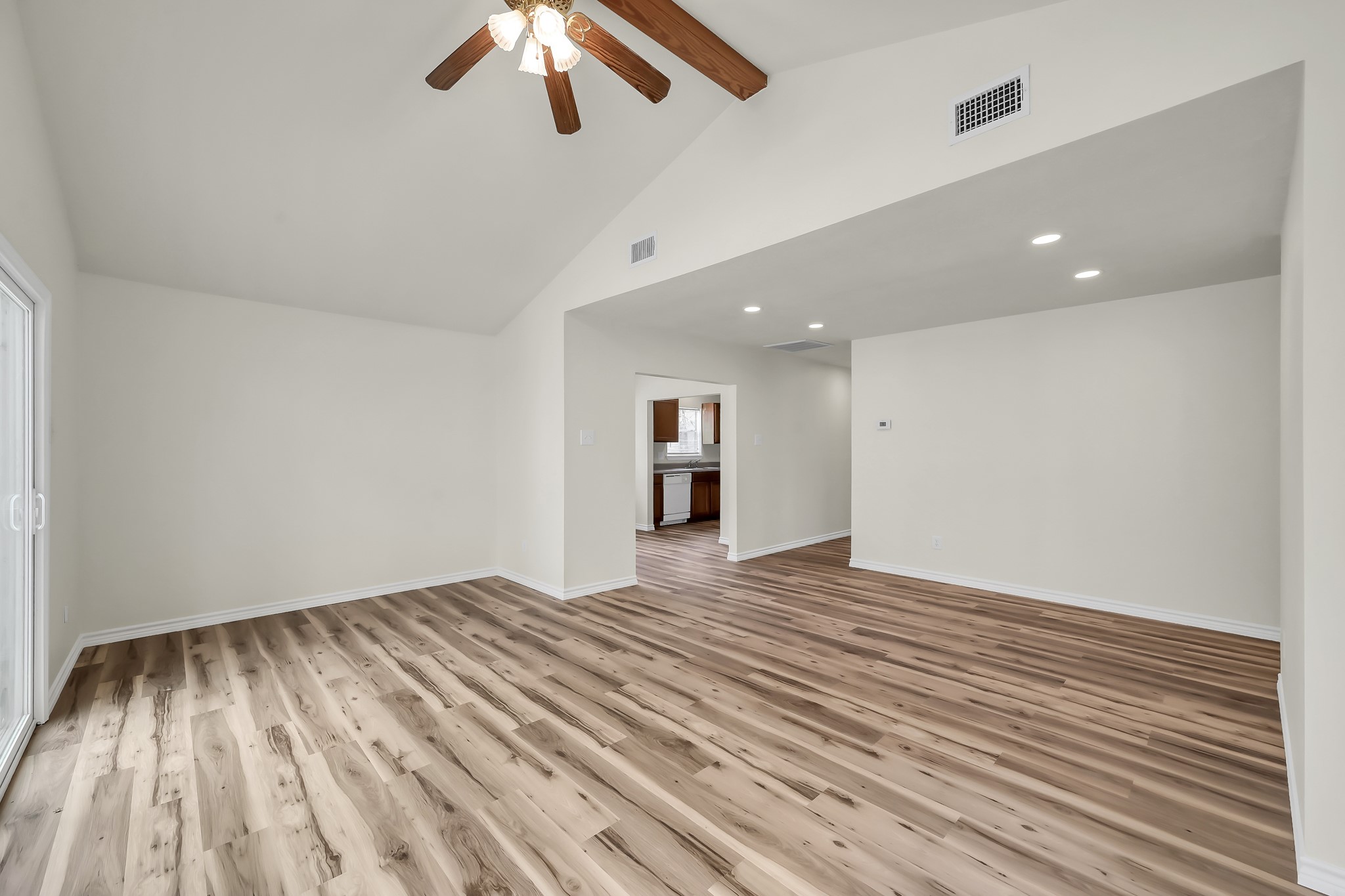 6 Hollow Forest Trinity, TX 75862 - Photo 16 of 38 a view of empty room with wooden floor and ceiling fan