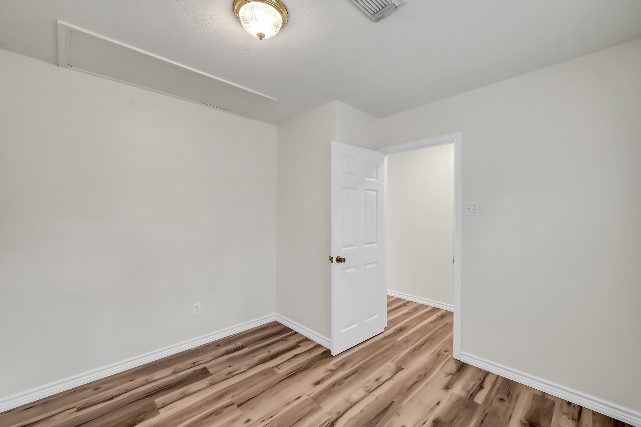 6 Hollow Forest Trinity, TX 75862 - Photo 28 of 38 a view of a room with wooden floor