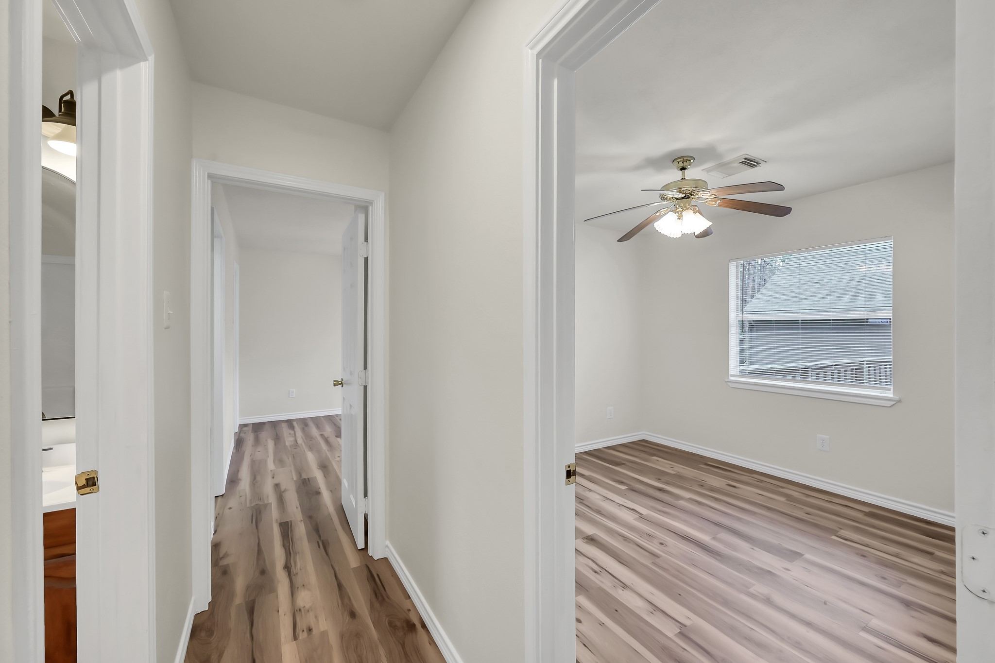 6 Hollow Forest Trinity, TX 75862 - Photo 29 of 38 a view of a bedroom with wooden floor