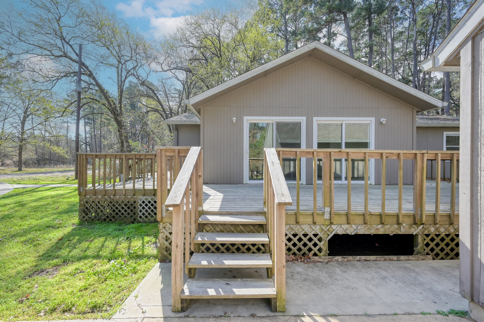 6 Hollow Forest Trinity, TX 75862 - Photo 3 of 38 a front view of a house with a yard