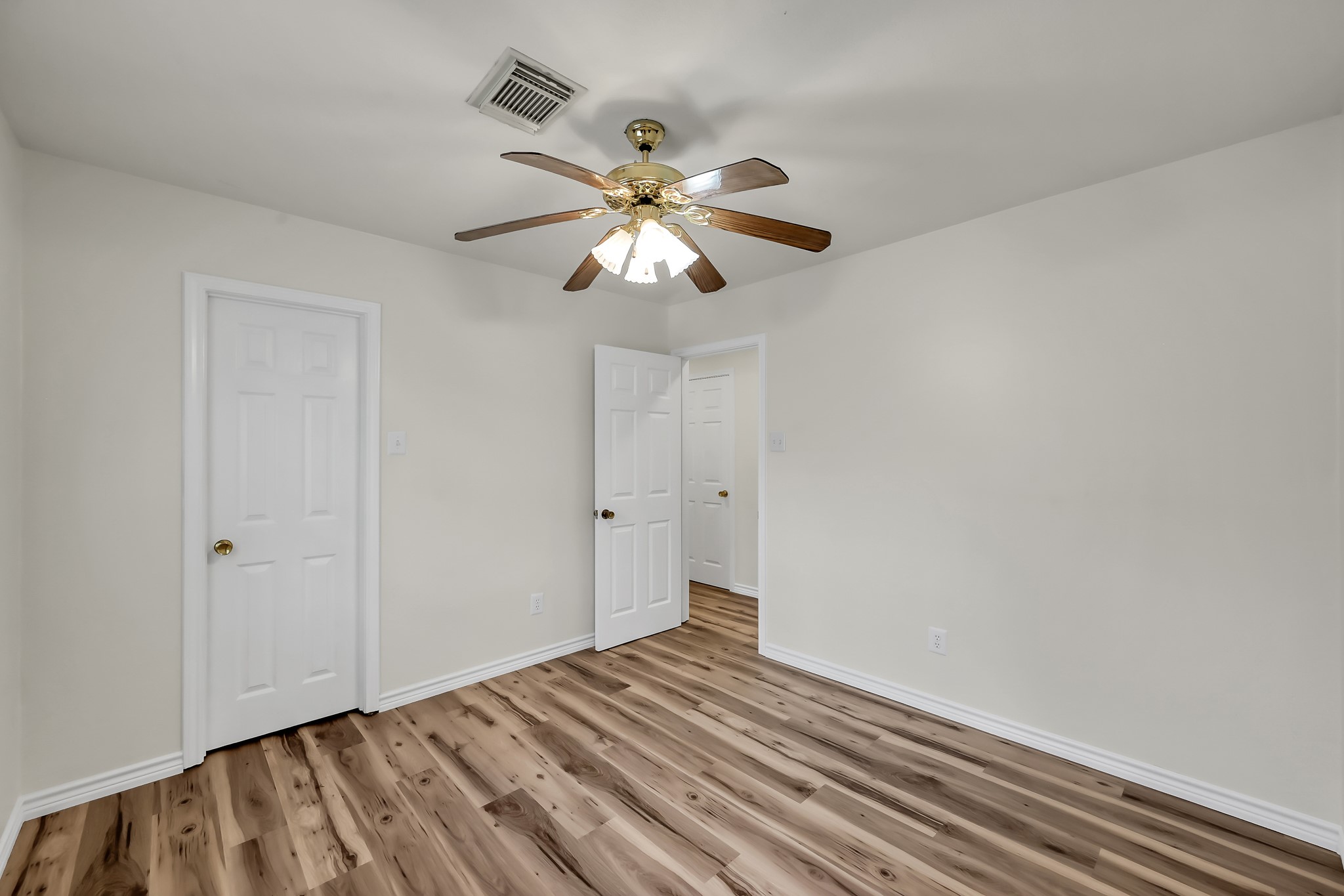 6 Hollow Forest Trinity, TX 75862 - Photo 31 of 38 a view of empty room with wooden floor