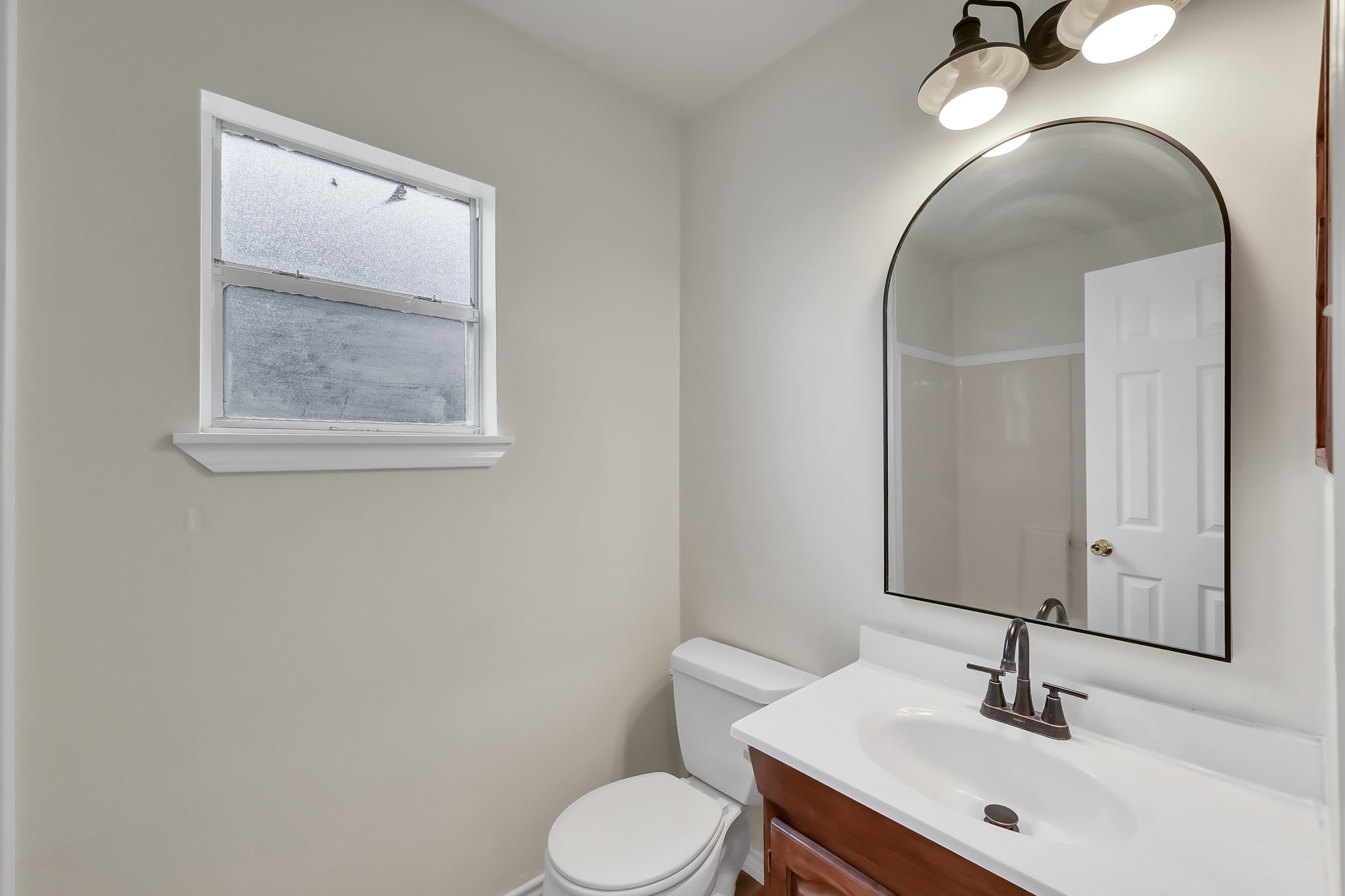 6 Hollow Forest Trinity, TX 75862 - Photo 32 of 38 a bathroom with a sink and a mirror