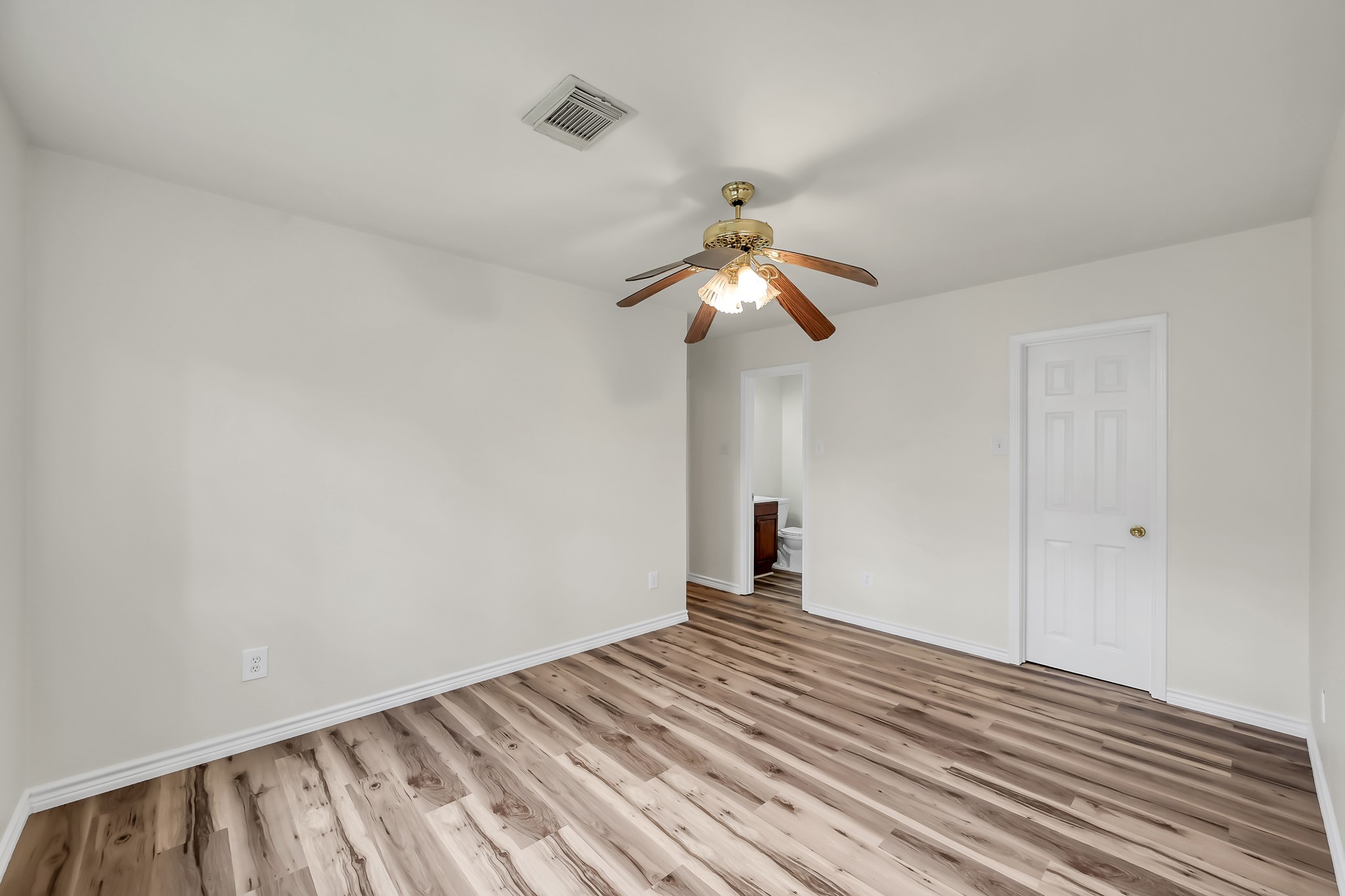6 Hollow Forest Trinity, TX 75862 - Photo 35 of 38 a view of empty room with wooden floor