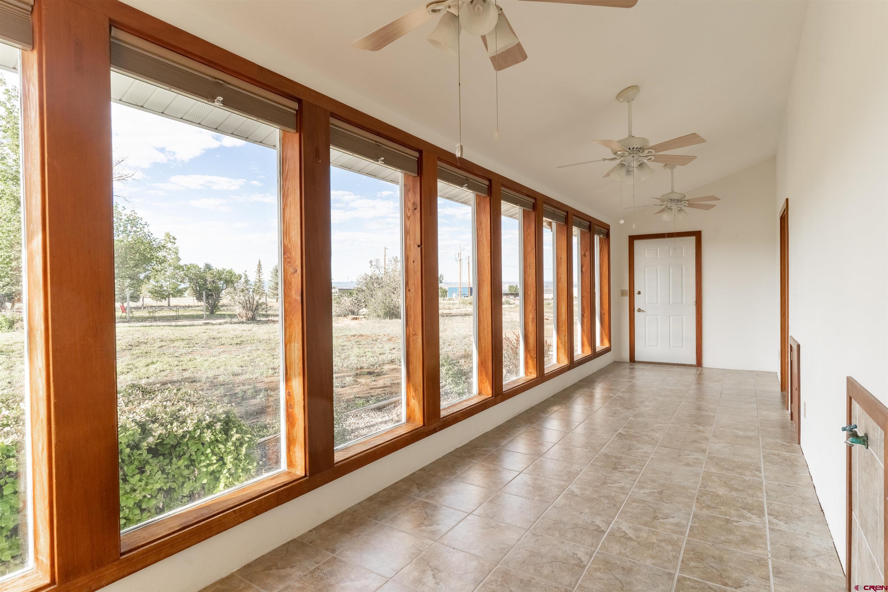 3754 2000th Road Delta, CO 81416 - Photo 12 of 35 a view of an empty room with windows