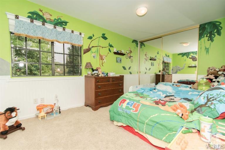 512 Fresh Meadows Road Simi Valley, CA 93065 - Photo 22 of 38 a bedroom with a bed and a dresser in it