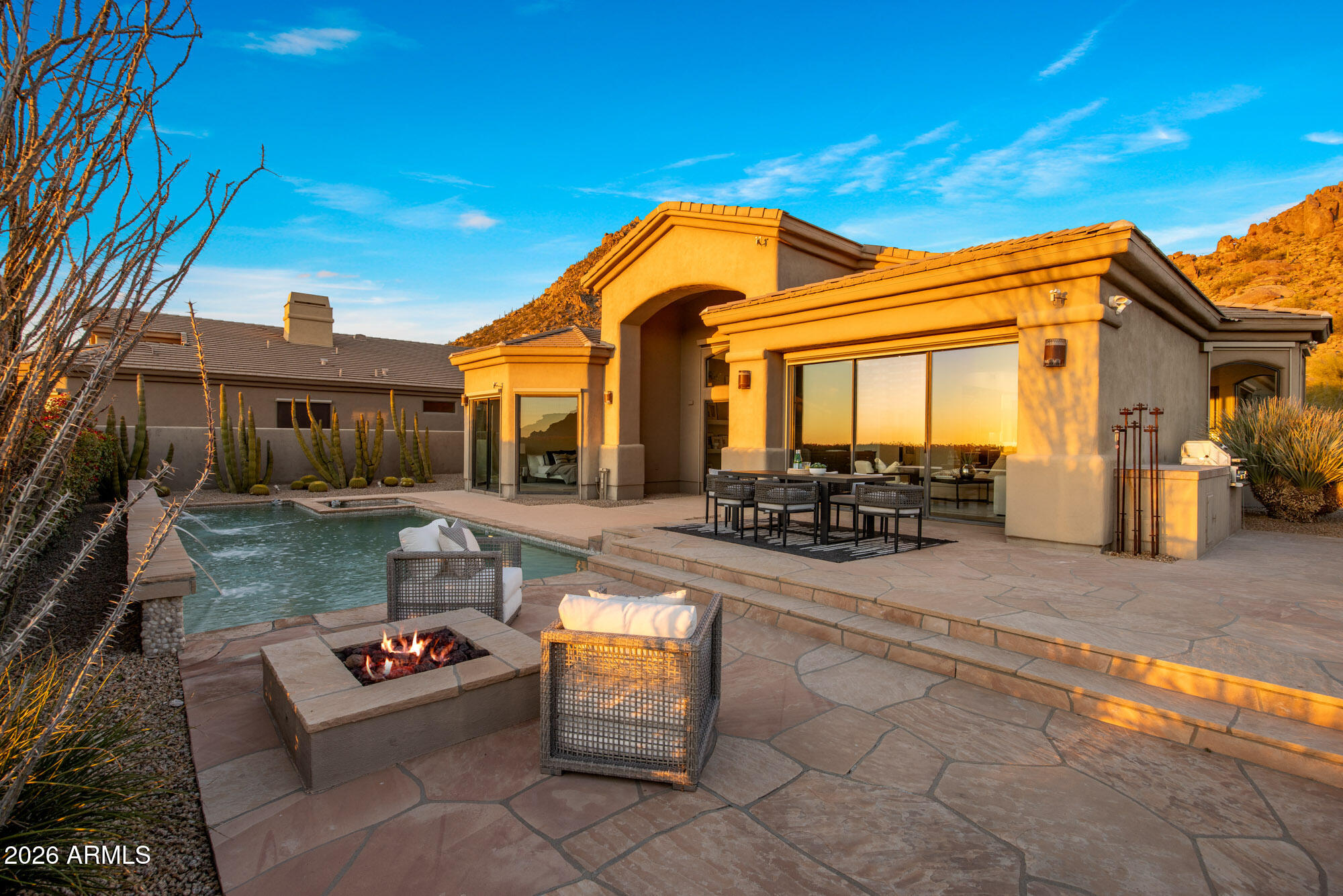 11083 East Juan Tabo Road Scottsdale, AZ 85255 - Photo 35 of 46 a front view of a house with patio