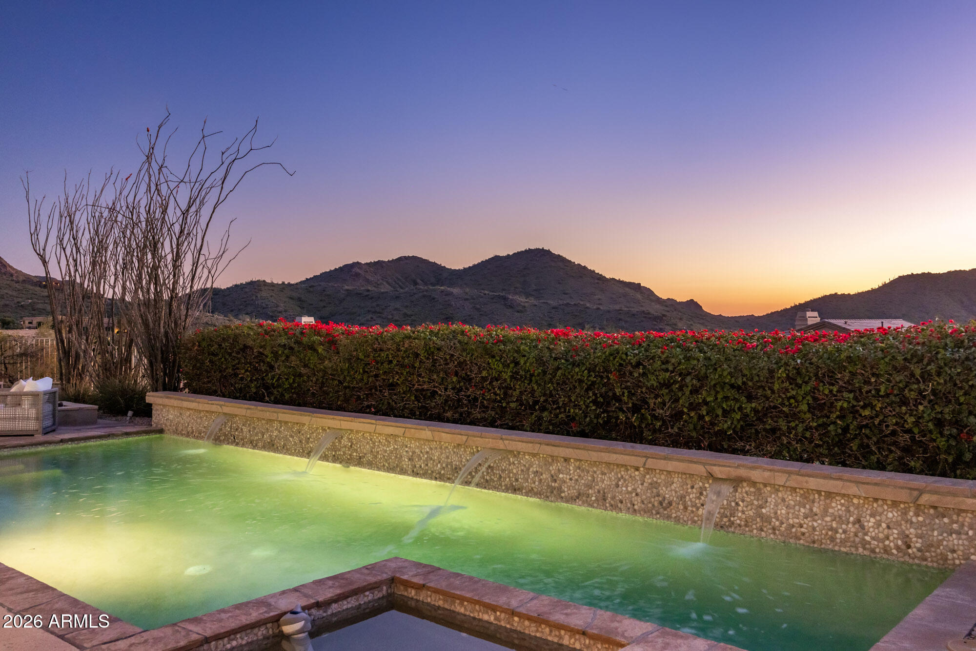 11083 East Juan Tabo Road Scottsdale, AZ 85255 - Photo 38 of 46 a view of a backyard with a garden