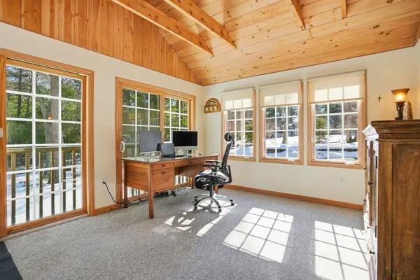 a workspace with furniture window and outside view