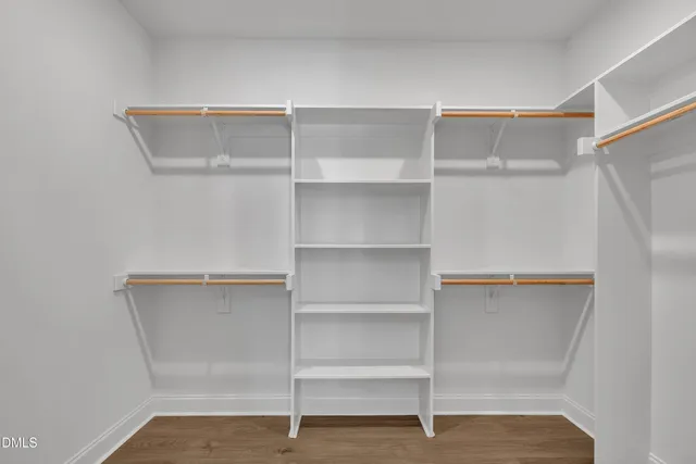 a view of an empty walk in closet