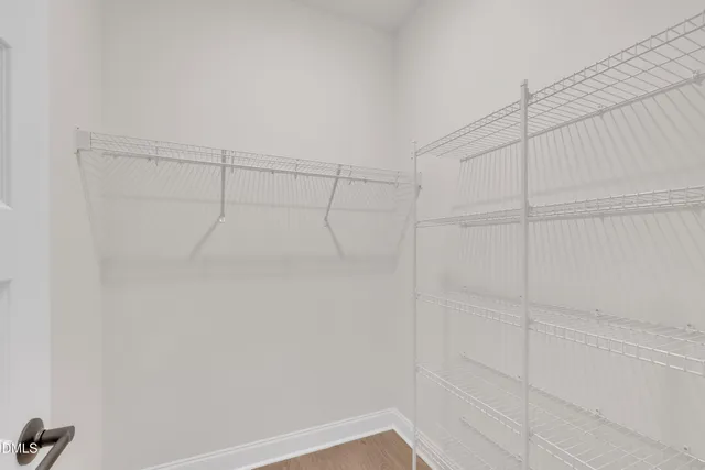 a view of a room with racks on the wall