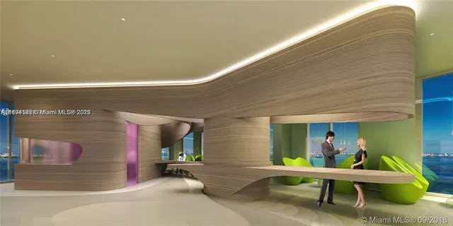 a view of swimming pool with seating area