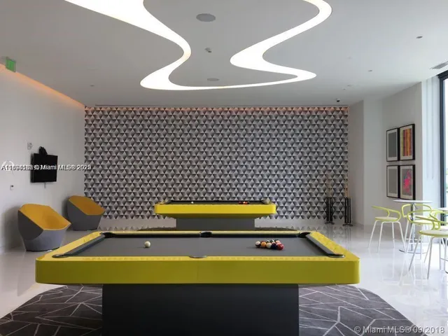 a vase of flowers sitting on a table