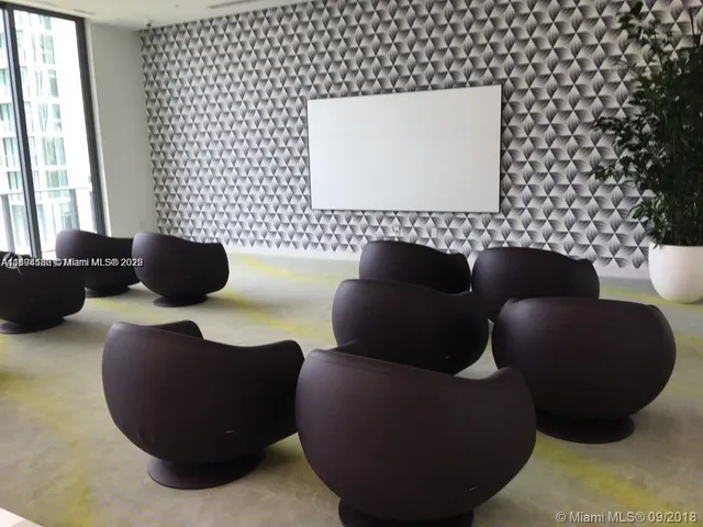 a view of swimming pool with a yard