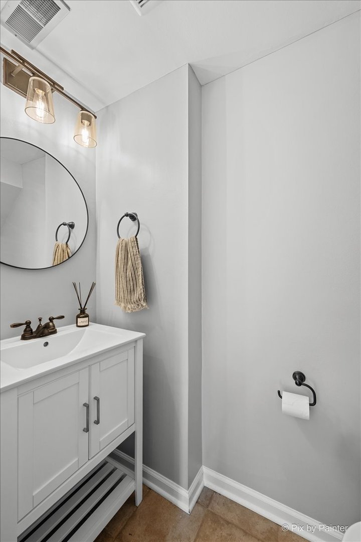 1150 Appleton Lane Geneva, IL 60134 - Photo 21 of 43 a bathroom with a sink and a mirror