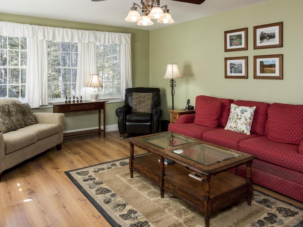 3 Valley Road Boothbay, ME 04537 - Photo 2 of 22 The living room with laminate flooring.