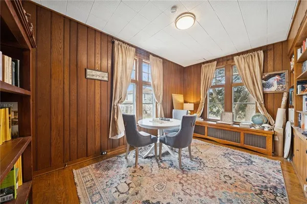 a living room with a furniture and a window