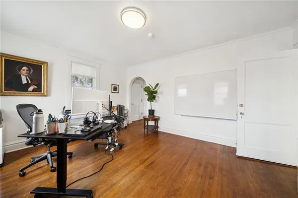a view of a livingroom with furniture and a table