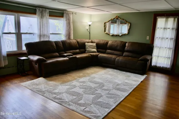 a living room with furniture and a couch