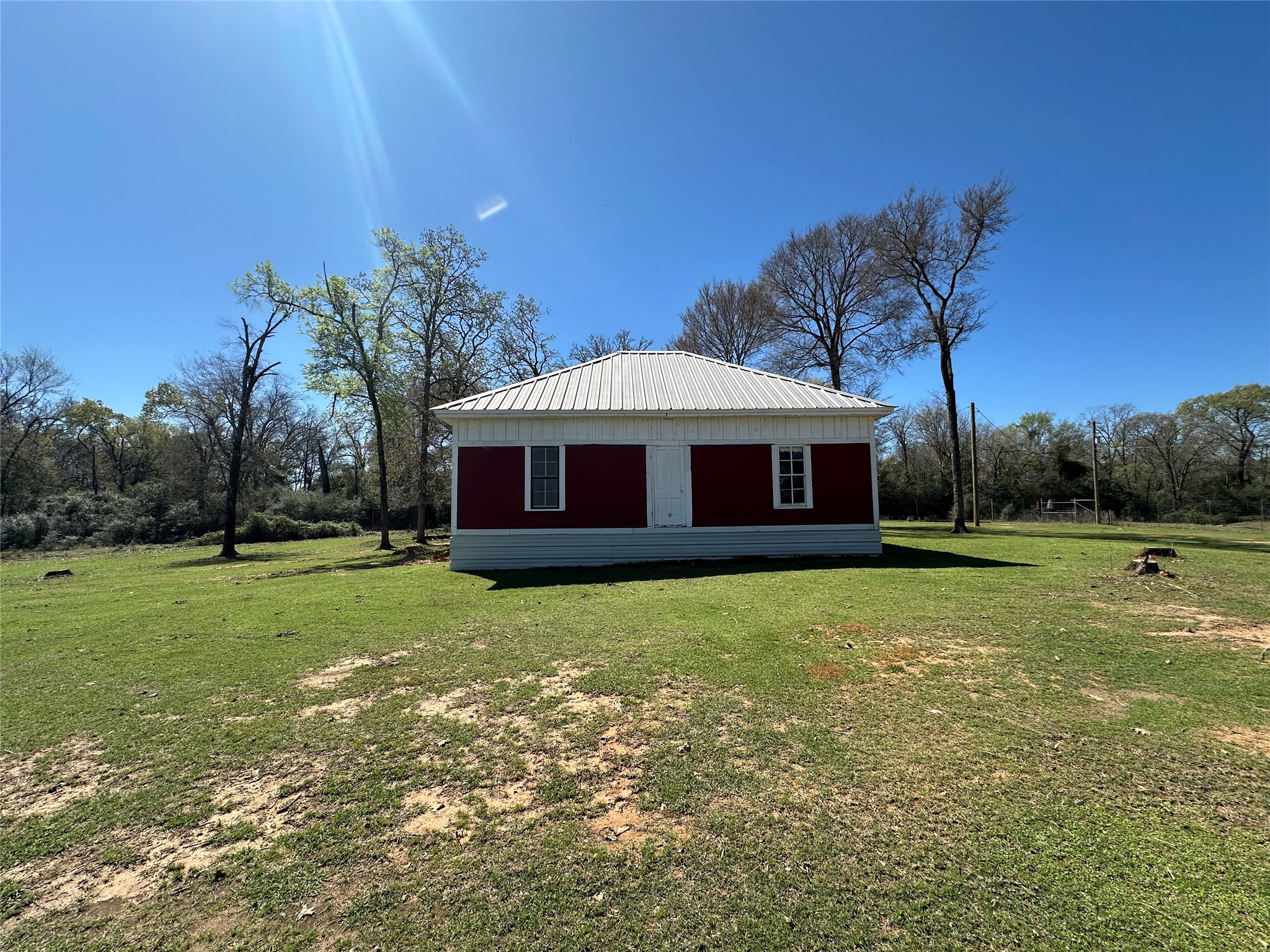 8773 I-45 Street South Centerville, TX 75833 - Photo 21 of 35 a front view of a house with garden