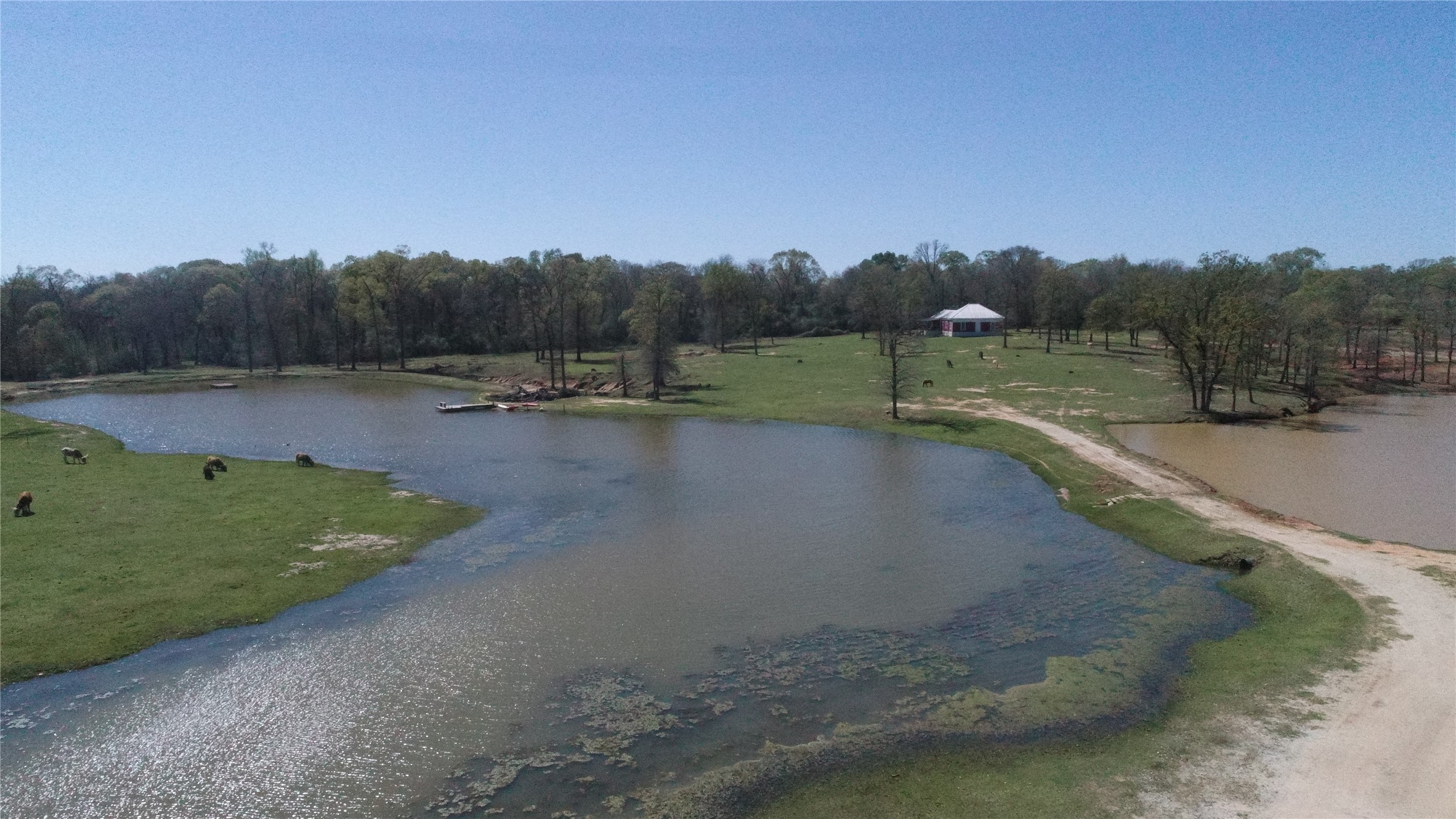 8773 I-45 Street South Centerville, TX 75833 - Photo 28 of 35 a view of a lake with outdoor space and trees all around