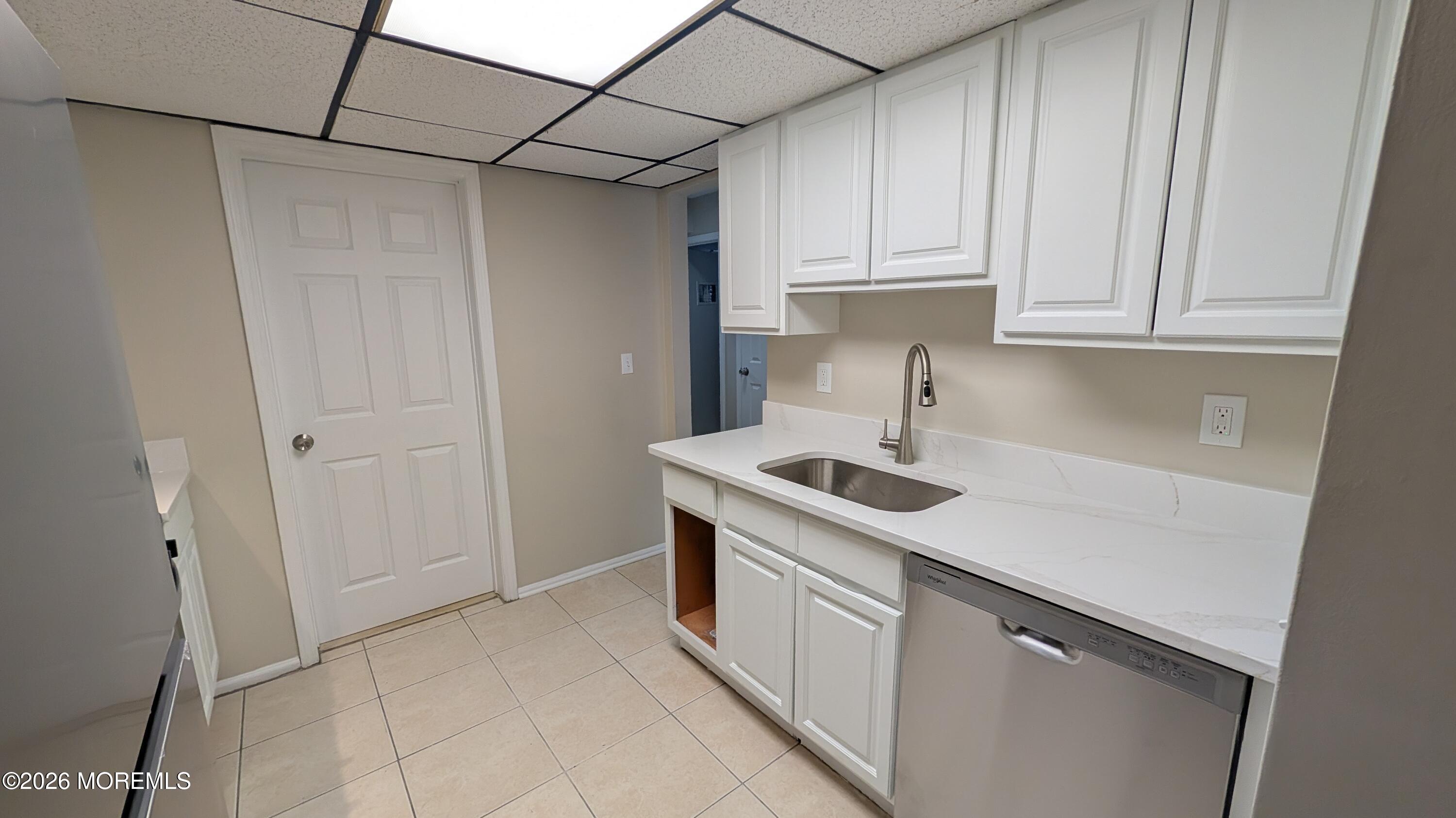 21 Jesse Road Howell, NJ 07731 - Photo 11 of 30 a kitchen with stainless steel appliances granite countertop a sink and a refrigerator