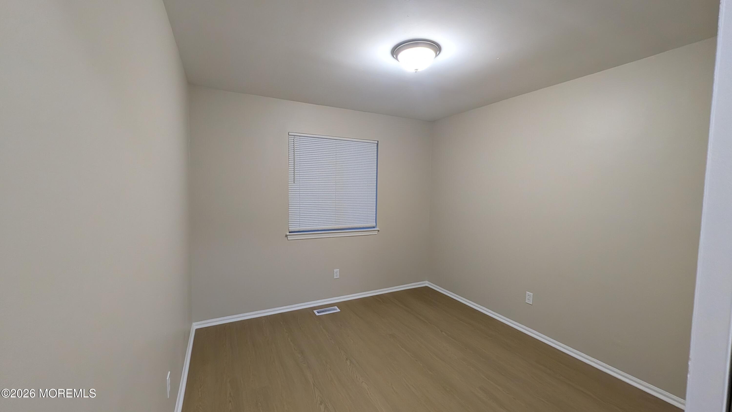 21 Jesse Road Howell, NJ 07731 - Photo 19 of 30 an empty room with a window