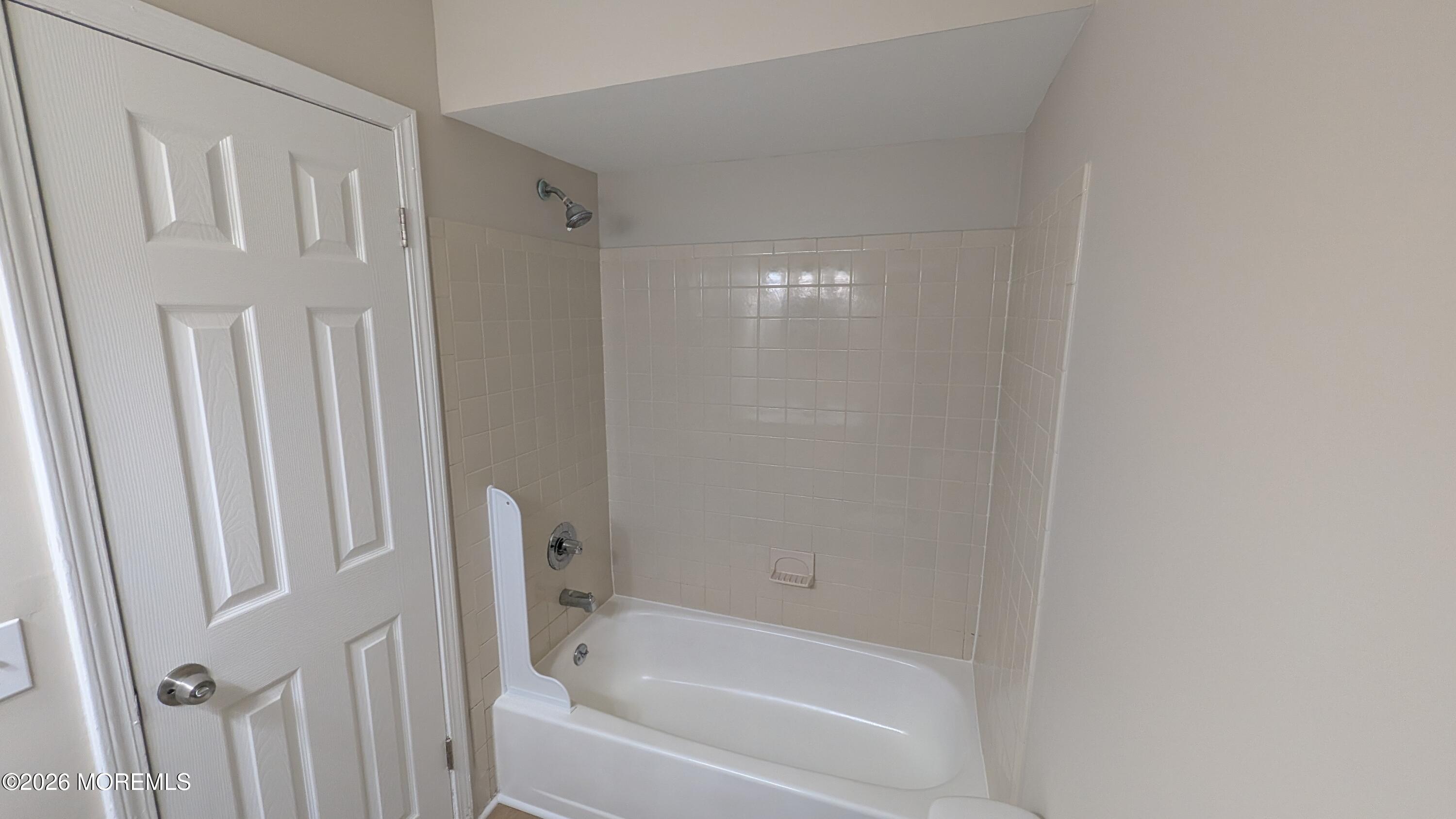 21 Jesse Road Howell, NJ 07731 - Photo 26 of 30 a bathroom with bathtub and shower