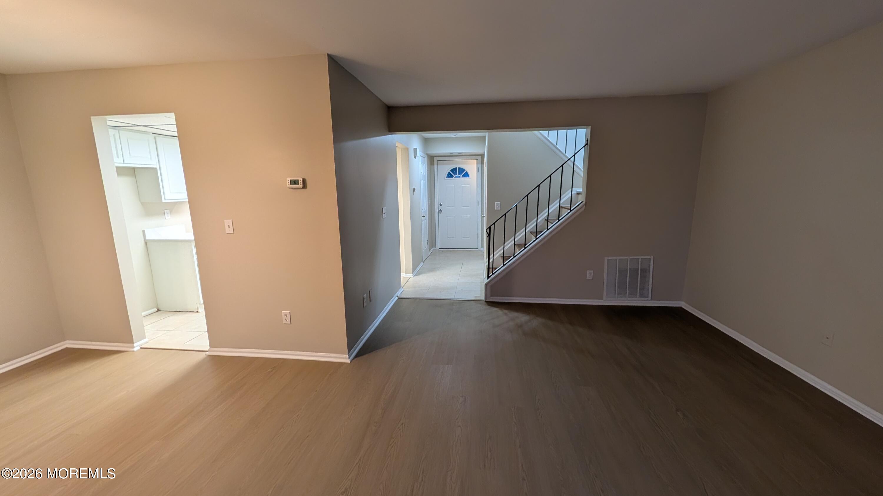 21 Jesse Road Howell, NJ 07731 - Photo 4 of 30 a view of a hallway with staircase
