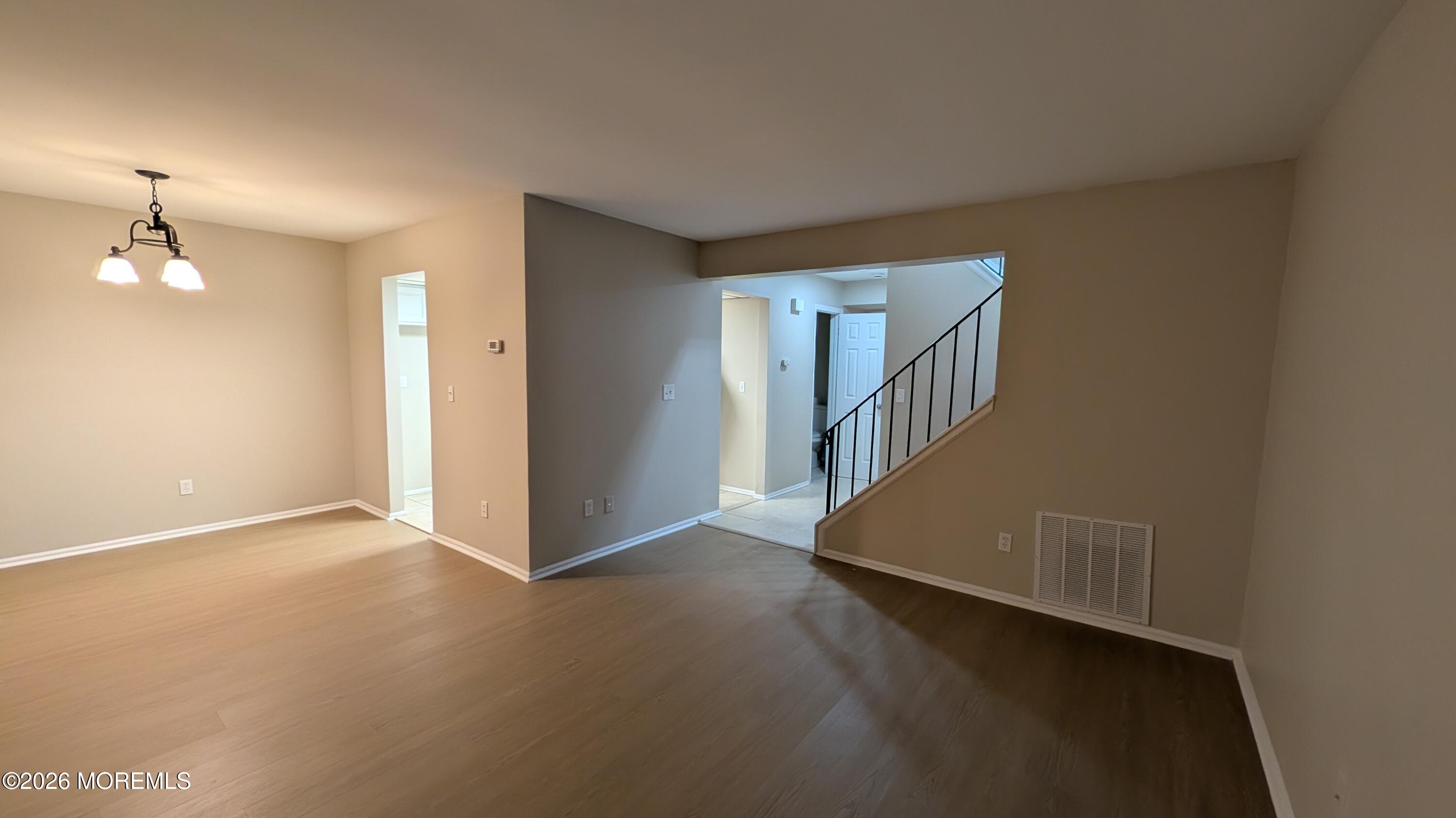 21 Jesse Road Howell, NJ 07731 - Photo 6 of 30 a view of an empty room with windows