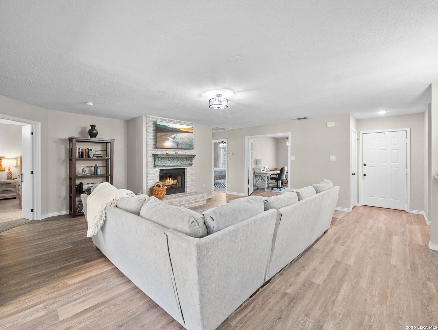 3620 Chestnut Court Cibolo, TX 78108 - Photo 17 of 45 a living room with furniture and a wooden floor
