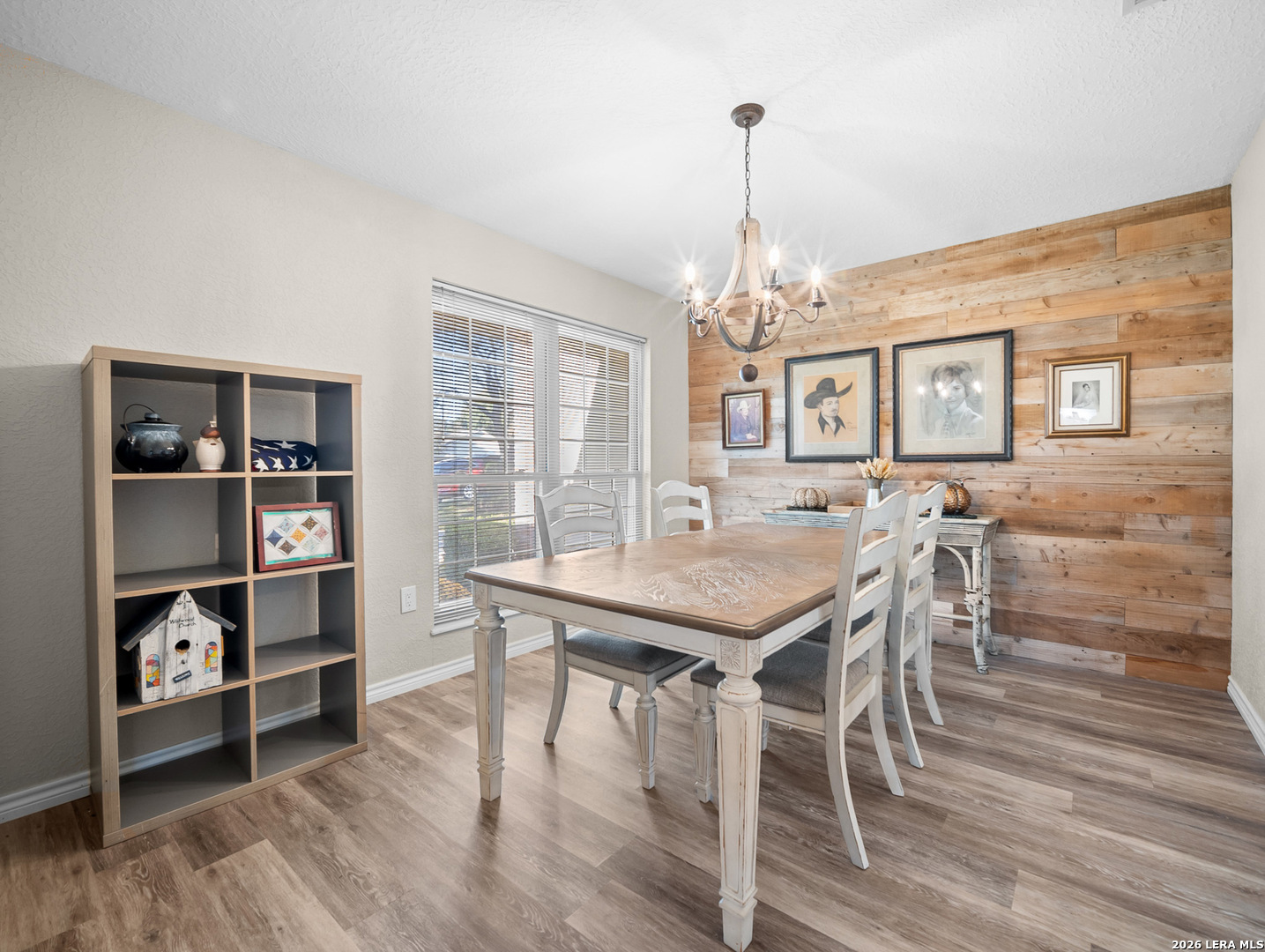 3620 Chestnut Court Cibolo, TX 78108 - Photo 19 of 45 a view of a dining room with furniture window and wooden floor