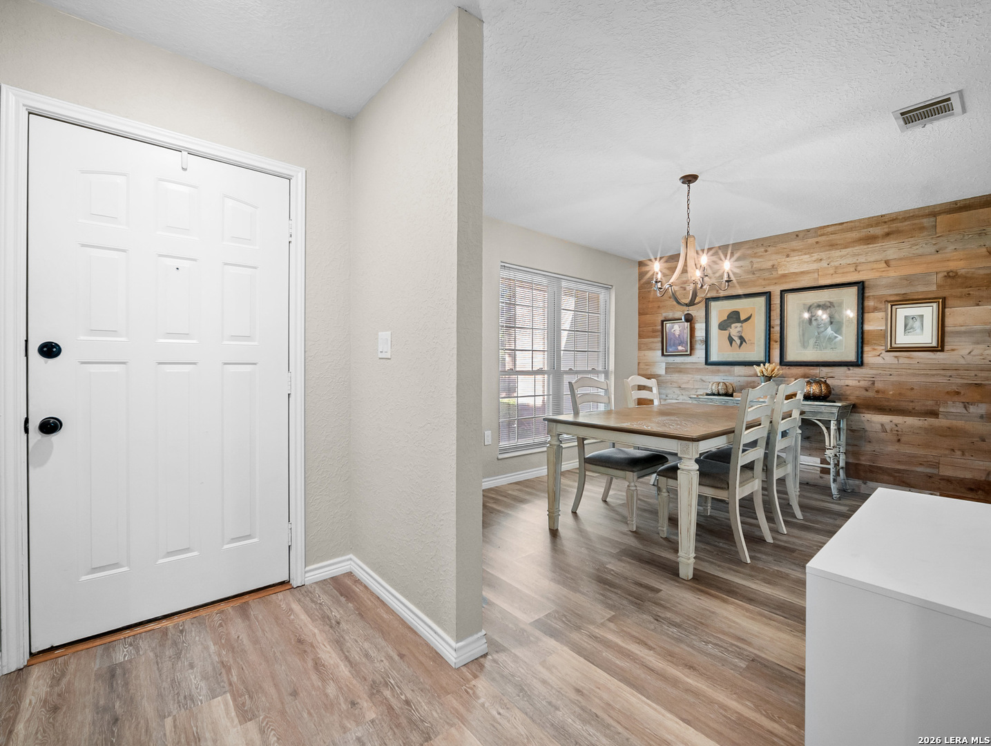 3620 Chestnut Court Cibolo, TX 78108 - Photo 20 of 45 an open room with wooden floor furniture and windows