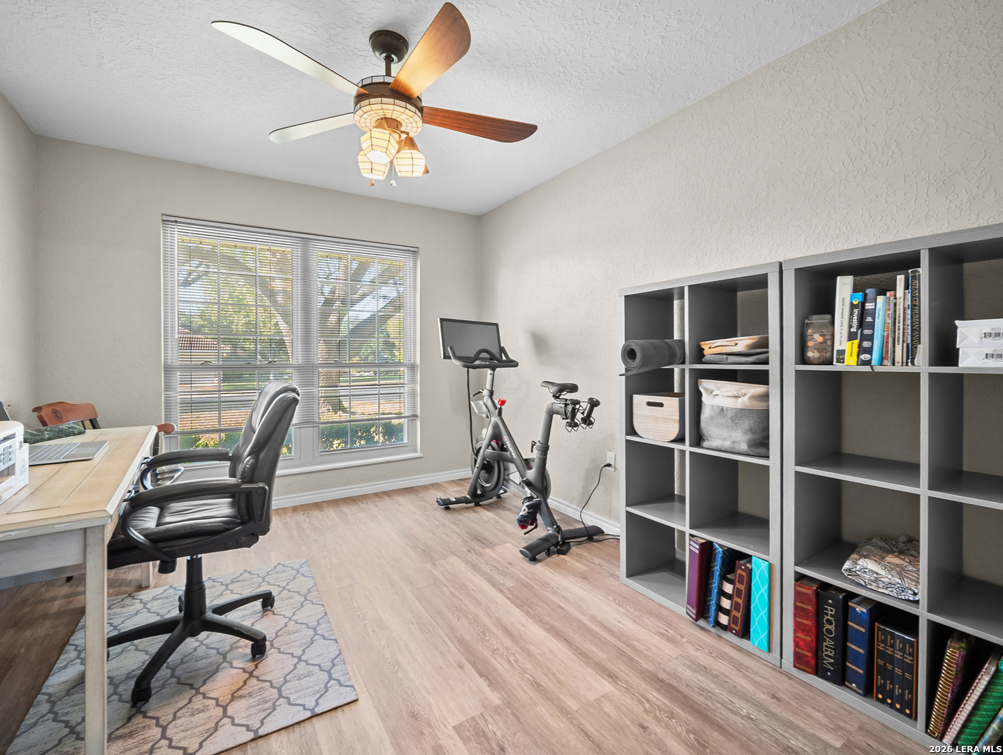 3620 Chestnut Court Cibolo, TX 78108 - Photo 21 of 45 a view of a workspace with furniture and a bookshelf