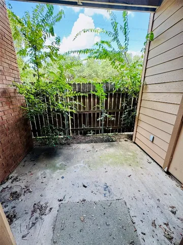 a view of a porch with a bench