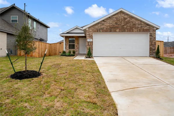 a view of backyard of a house