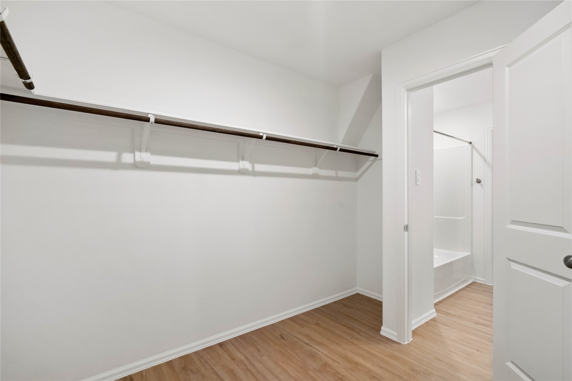 104 Pine Bend Magnolia, TX 77354 - Photo 14 of 25 a view of an empty walk in closet