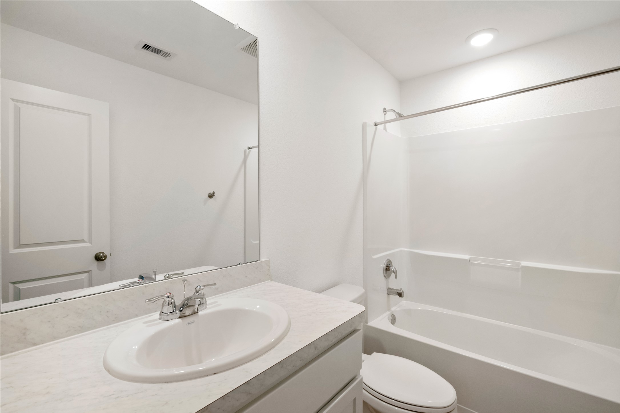 104 Pine Bend Magnolia, TX 77354 - Photo 16 of 25 a bathroom with a sink toilet and a bathtub