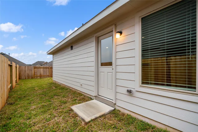 a view of backyard of house