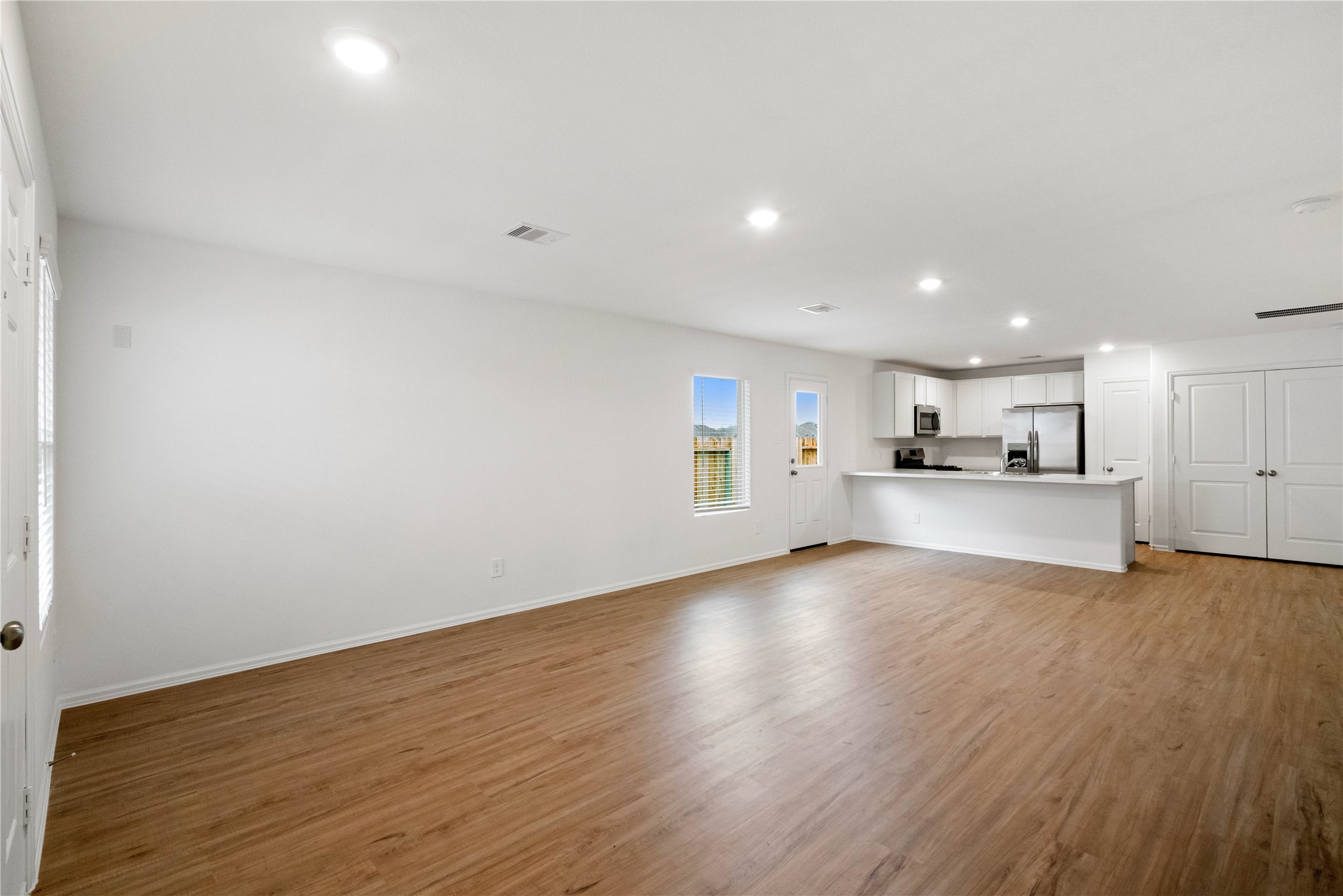 104 Pine Bend Magnolia, TX 77354 - Photo 4 of 25 a view of kitchen with wooden floor