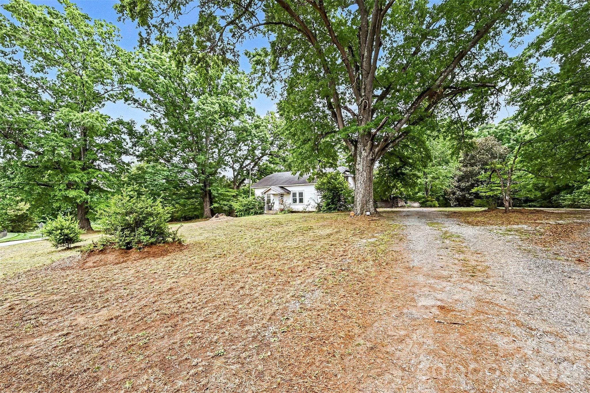 1116 Medlin Road Monroe, NC 28112 - Photo 12 of 40 a view of yard with large trees